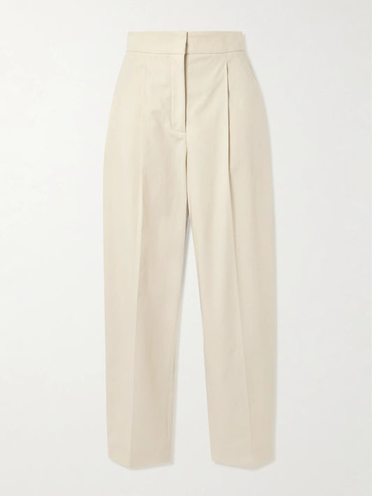 Image of a model wearing Pants. Product name - Paver Cotton-gauze Tapered Pants in Off-white colour by brand - Joseph