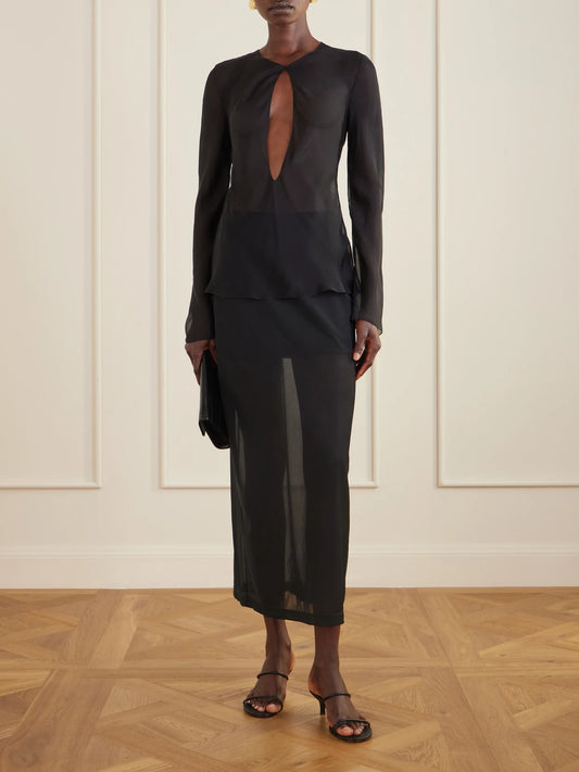 Image of a model wearing Tops. Product name - Cut-out Silk-chiffon Blouse in Black colour by brand - Colleen Allen