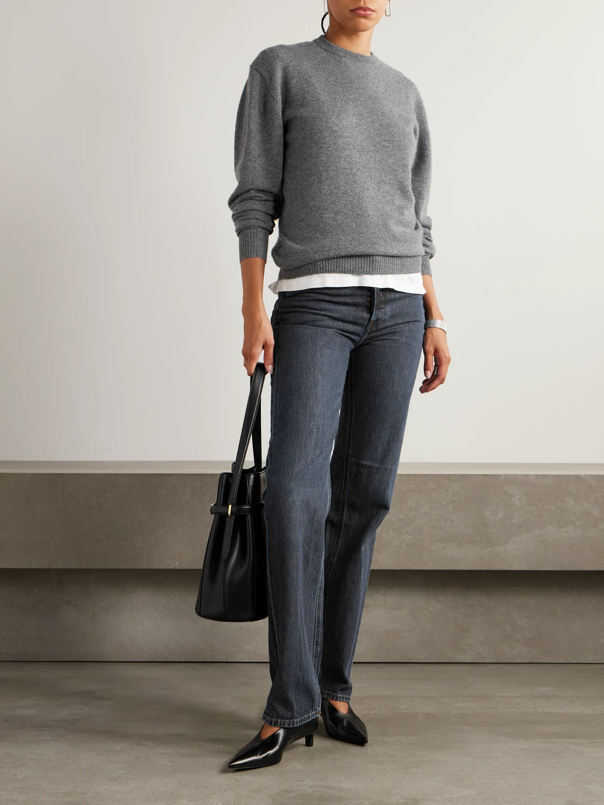 Image of a model wearing Outerwear. Product name - Cashmere Sweater in Gray colour by brand - TOTEME