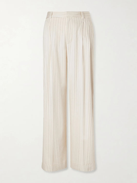 Image of a model wearing Pants. Product name - Avenue Pleated Striped Woven Wide-leg Pants in White colour by brand - FRAME