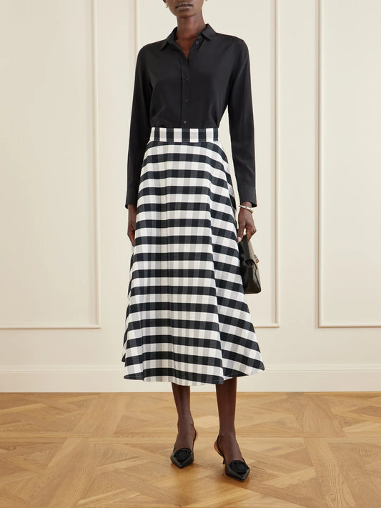 Image of a model wearing Skirts. Product name - Vichy Cotton-blend Maxi Skirt in Black colour by brand - Marta Ferri