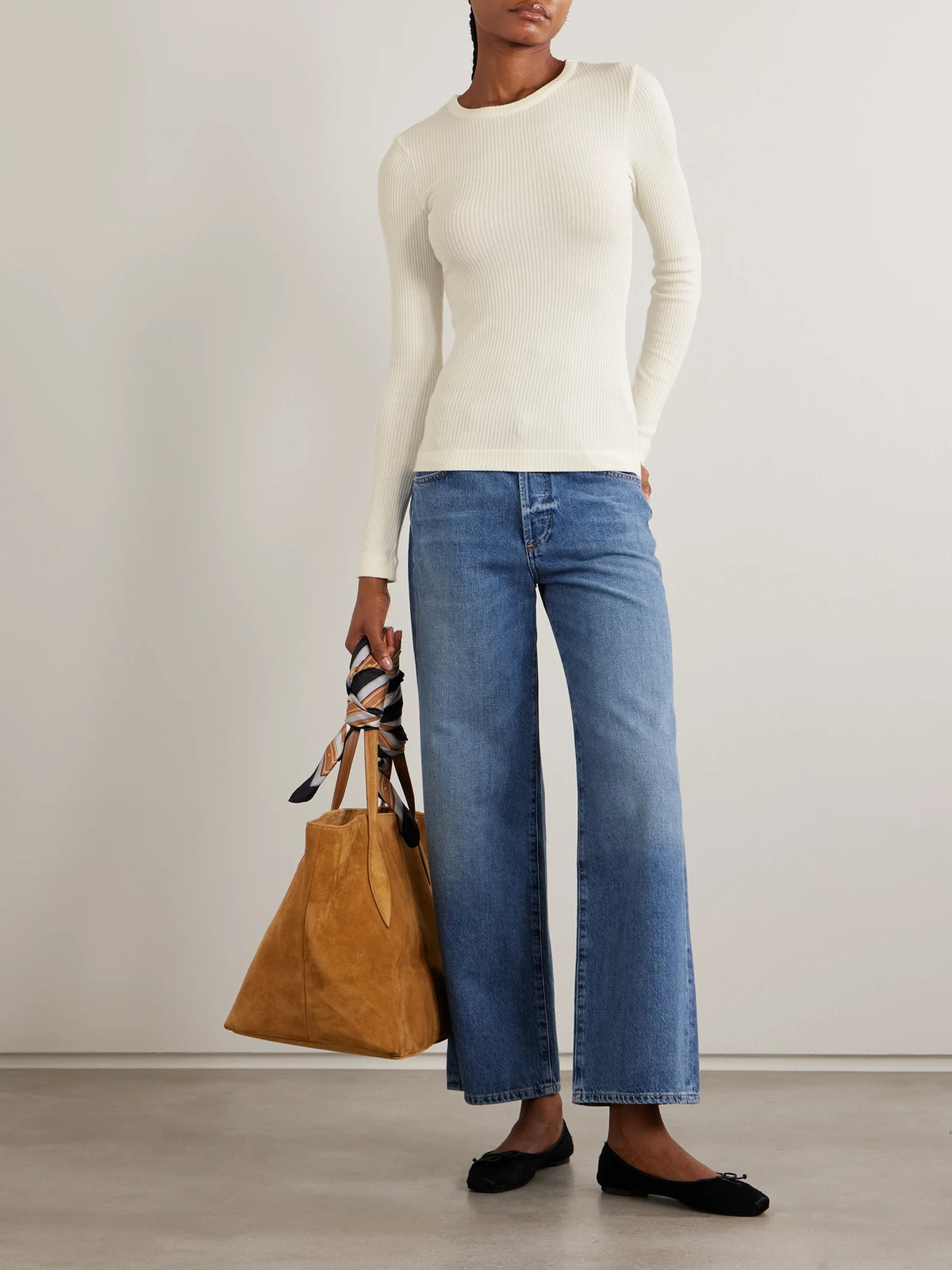 Image of a model wearing Tops. Product name - Bina Ribbed Stretch-lyocell And Organic Cotton-blend Top in Cream colour by brand - Citizens of Humanity