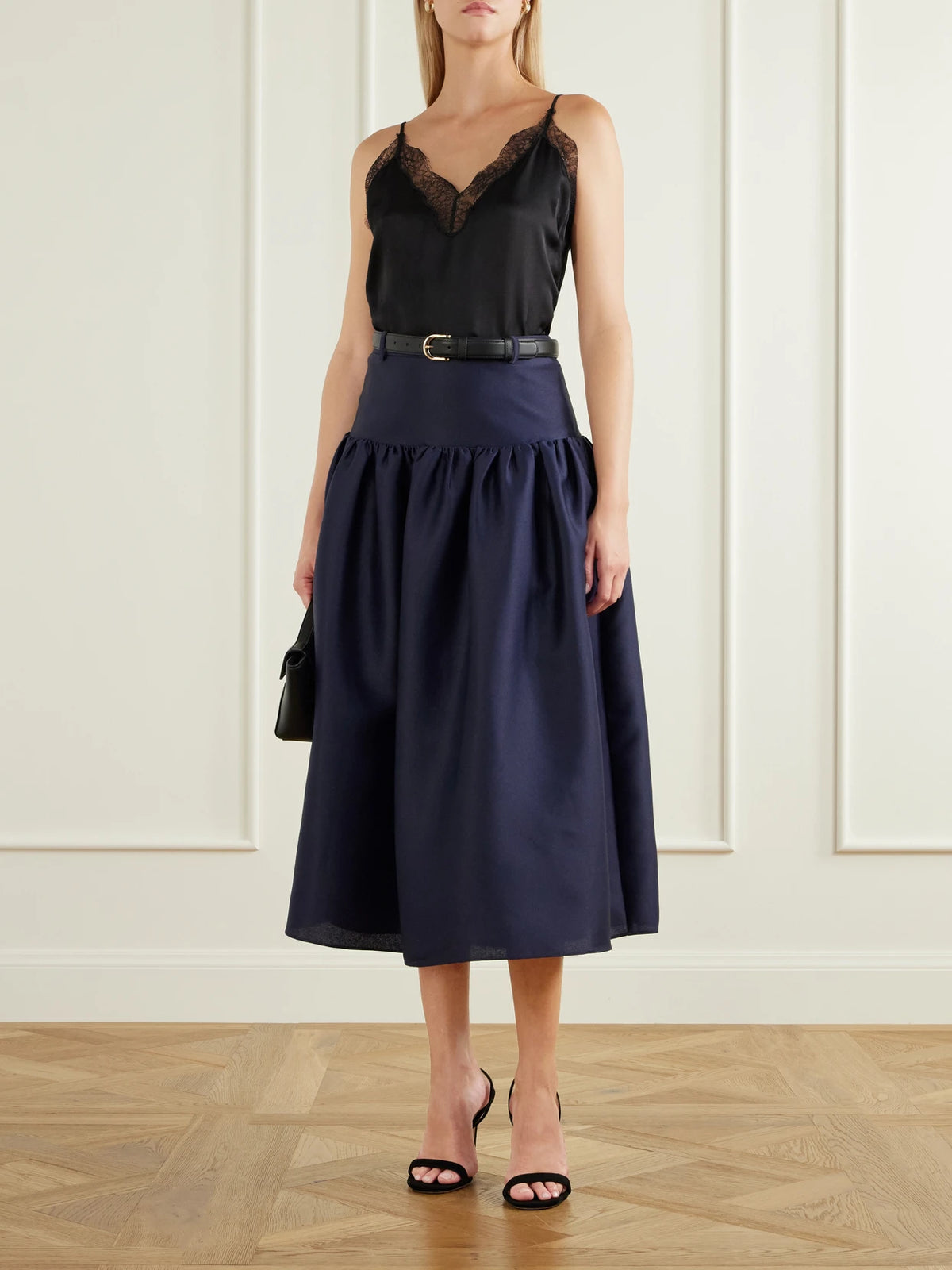 Image of a model wearing Skirts. Product name - Gathered Taffeta Midi Skirt in Navy colour by brand - Self-Portrait