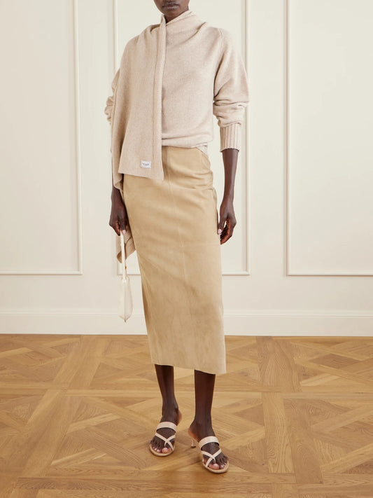 Image of a model wearing Outerwear. Product name - Draped Wool Sweater in Beige colour by brand - The Attico