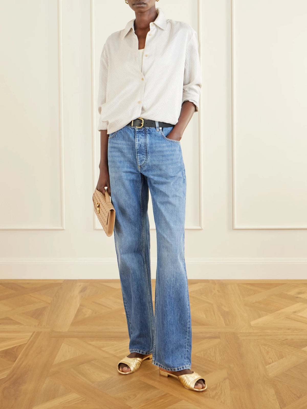 Image of Sandals. Product name - Parua Pleated Metallic Leather Slides in Gold colour by brand - Manolo Blahnik