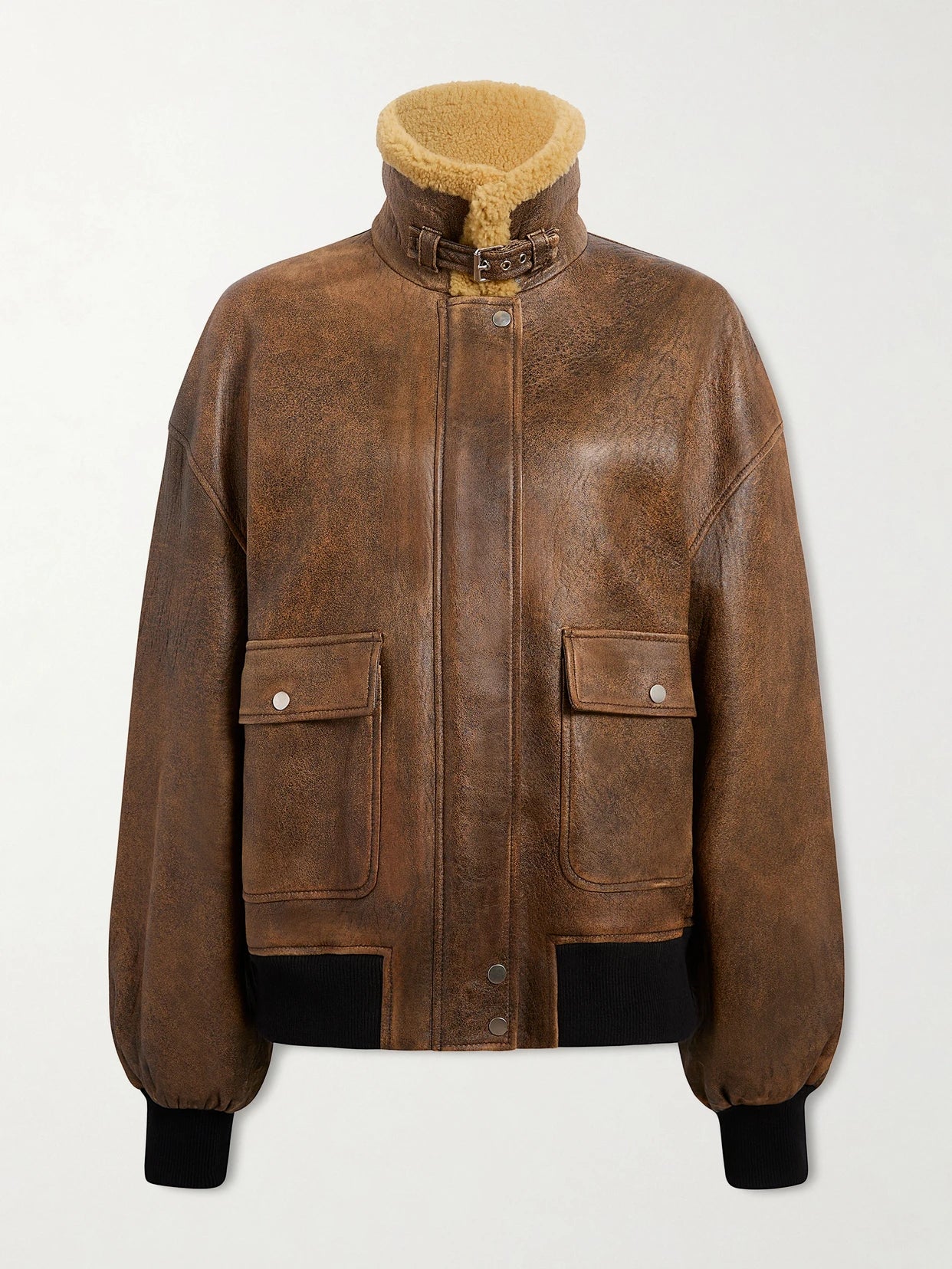 Image of Coats & Jackets. Product name - Sandor Shearling-trimmed Leather Jacket in Brown colour by brand - KHAITE