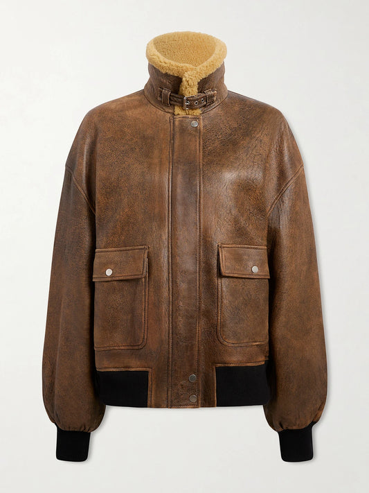 Image of Coats & Jackets. Product name - Sandor Shearling-trimmed Leather Jacket in Brown colour by brand - KHAITE