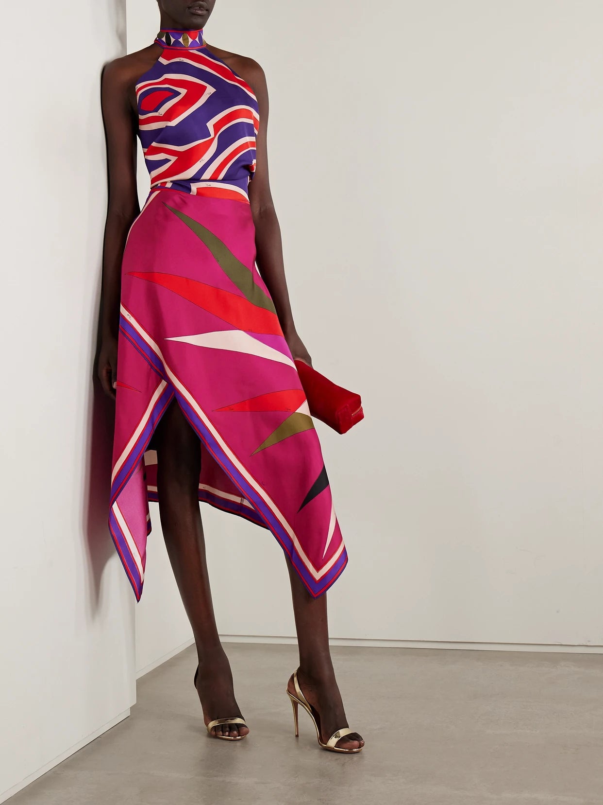 Image of a model wearing Skirts. Product name - Asymmetric Printed Silk-twill Maxi Skirt in Multi colour by brand - PUCCI