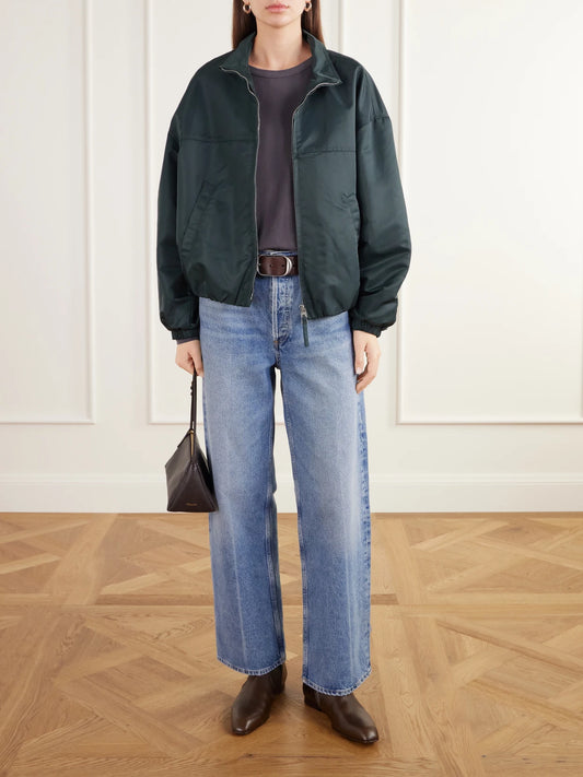 Image of a model wearing Tops. Product name - Margo Layered Cotton-jersey T-shirt in Gray colour by brand - LESET