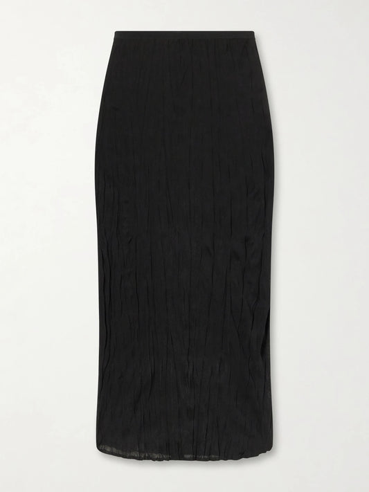 Image of a model wearing Skirts. Product name - Crinkled Knit Viscose Midi Skirt in Black colour by brand - TOTEME