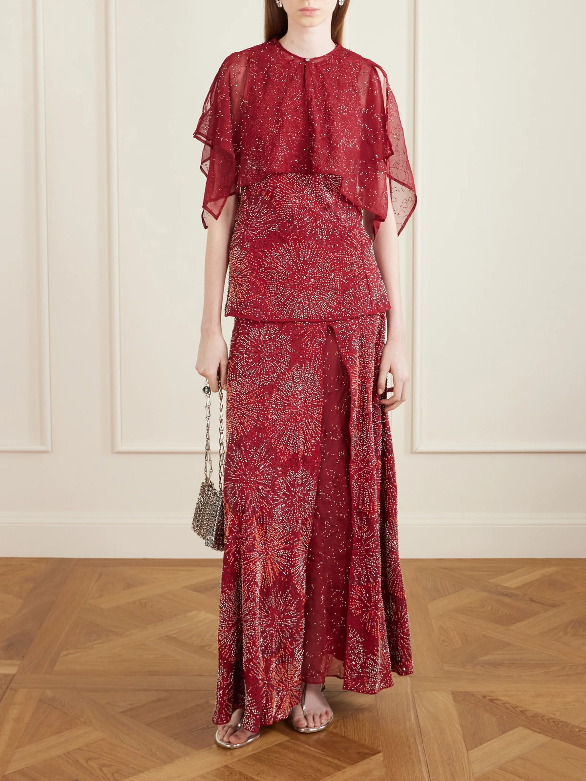 Image of a model wearing Tops. Product name - Bead-embellished Crepe And Chiffon Blouse in Red colour by brand - RABANNE