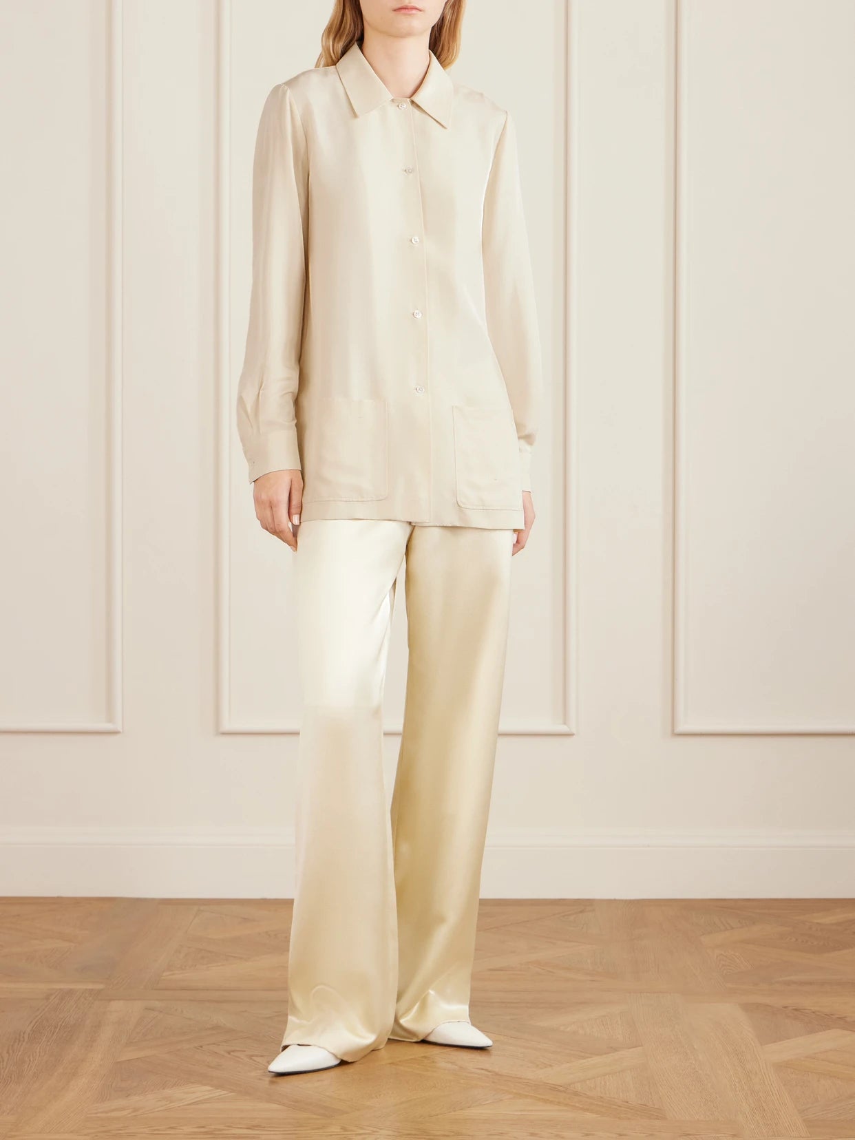 Image of a model wearing Tops. Product name - Lucetta Silk-shantung Shirt in Pastel yellow colour by brand - The Row