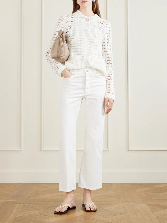 Image of a model wearing Outerwear. Product name - Sunny Crocheted Cotton Sweater in White colour by brand - Arch4