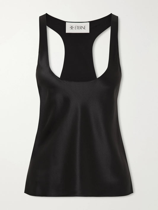 Image of a model wearing Tops. Product name - Hedi Silk-blend Satin Tank in Black colour by brand - ÉTERNE