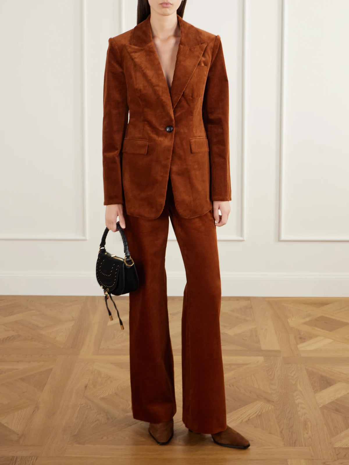 Image of a model wearing Outerwear. Product name - Livvy Dickey Cotton-blend Corduroy Blazer in Orange colour by brand - Veronica Beard
