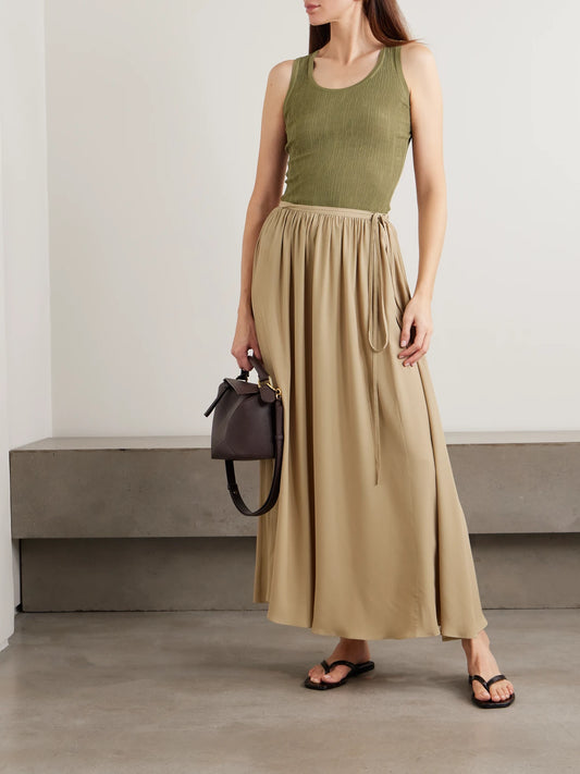 Image of a model wearing Tops. Product name - Bayt Cutout Textured-knit Tank in Army green colour by brand - Joseph