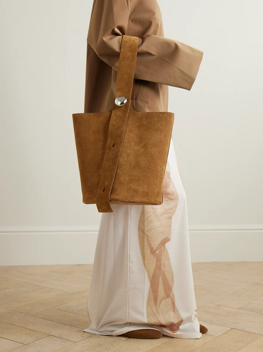 Image of Bags. Product name - Pebble Embellished Suede Bucket Bag in Camel colour by brand - LOEWE