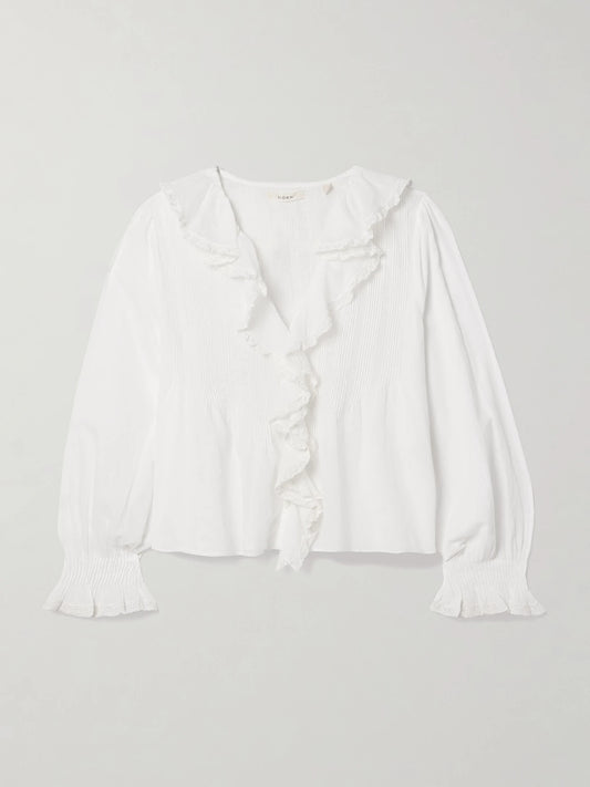 Image of a model wearing Tops. Product name - Hardy Lace-trimmed Ruffled Pintucked Organic Cotton-voile Blouse in White colour by brand - DÔEN
