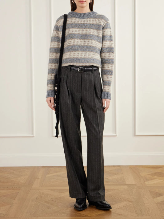 Image of a model wearing Pants. Product name - Harry Pinstriped Recycled Wool-twill Straight-leg Pants in Multi colour by brand - SKALL