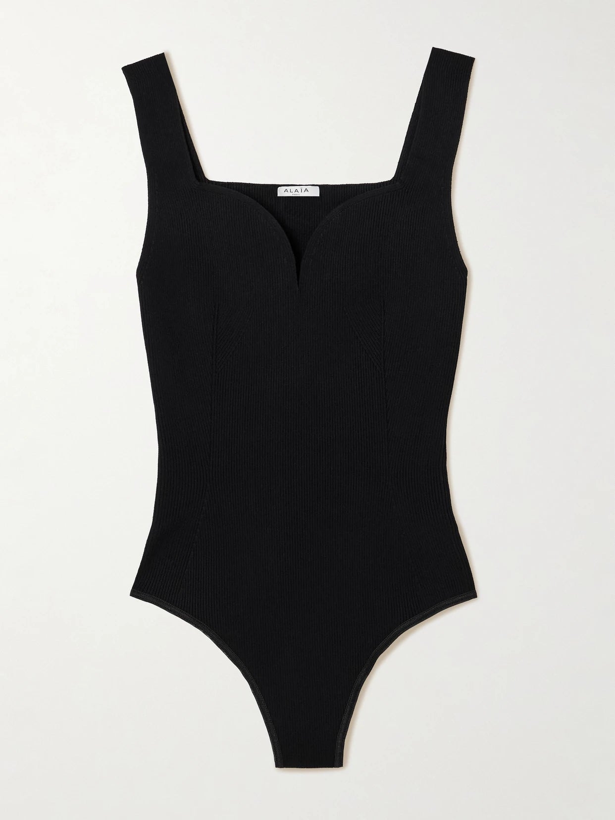 Image of a model wearing Tops. Product name - Ribbed Jersey Bodysuit in Black colour by brand - Alaïa