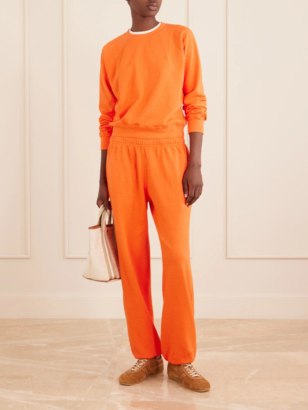 Image of Sleepwear & Loungewear. Product name - Tapered Cotton Track Pants in Orange colour by brand - ÉTERNE