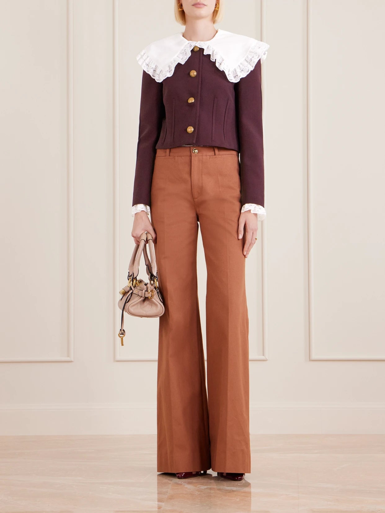 Image of a model wearing Pants. Product name - Organic Cotton Wide-leg Pants in Brown colour by brand - Chloé