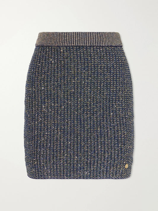 Image of a model wearing Skirts. Product name - Embroidered Metallic Tweed Mini Skirt in Multi colour by brand - Balmain