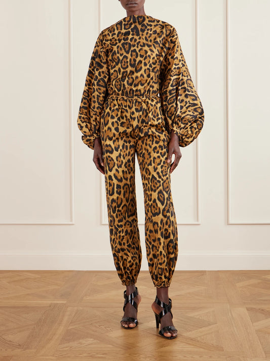 Image of a model wearing Pants. Product name - Leopard-print Shell Balloon Pants in Leopard print colour by brand - Alaïa