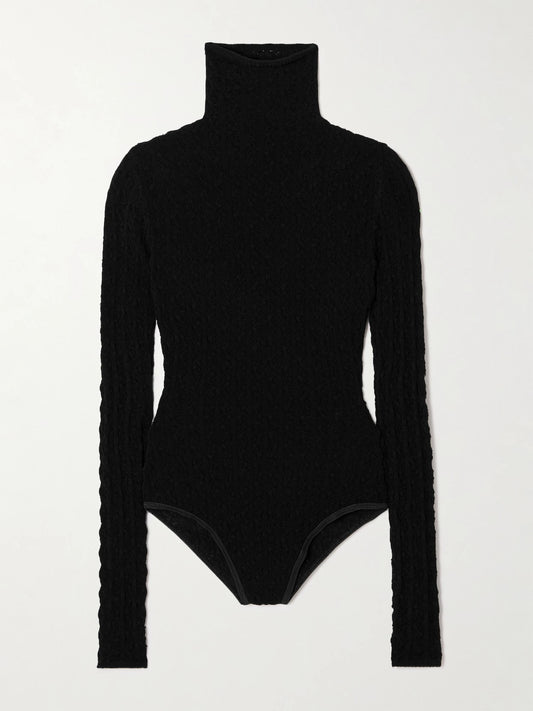 Image of a model wearing Tops. Product name - Open-knit Turtleneck Bodysuit in Black colour by brand - Alaïa