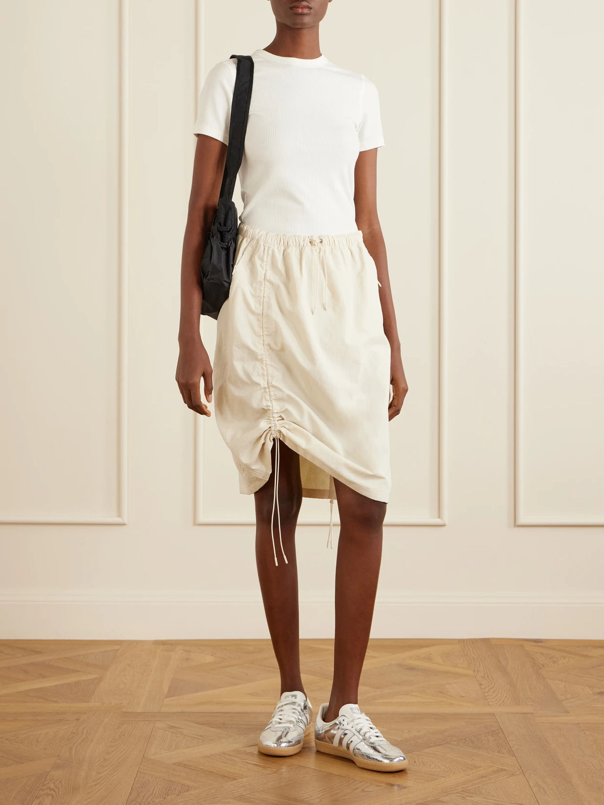 Image of a model wearing Tops. Product name - All-day Rib Lyocell And Cotton-blend T-shirt in Ivory colour by brand - ON