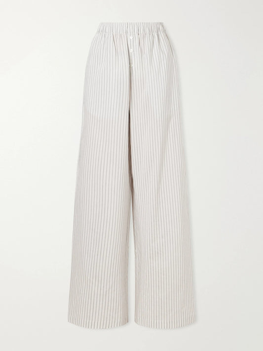 Image of a model wearing Pants. Product name - Striped Silk And Cotton-blend Wide-leg Pants in White colour by brand - RÓHE