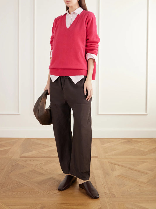 Image of a model wearing Outerwear. Product name - Zoe Wool-blend Sweater in Bright pink colour by brand - LESET