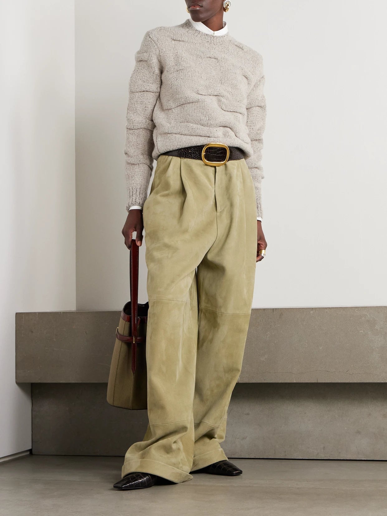 Image of a model wearing Outerwear. Product name - Gathered Knitted Wool Sweater in Light gray colour by brand - Loro Piana