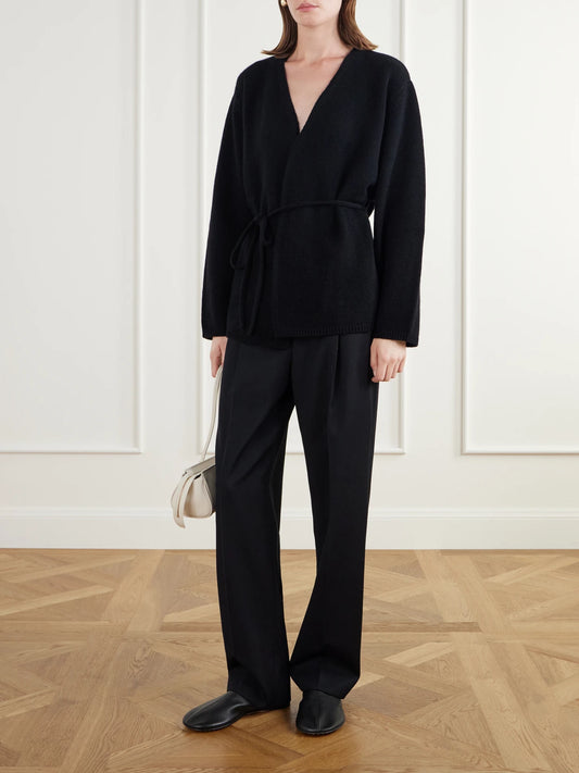 Image of a model wearing Outerwear. Product name - Fez Belted Merino Wool And Cashmere-blend Cardigan in Black colour by brand - Almada