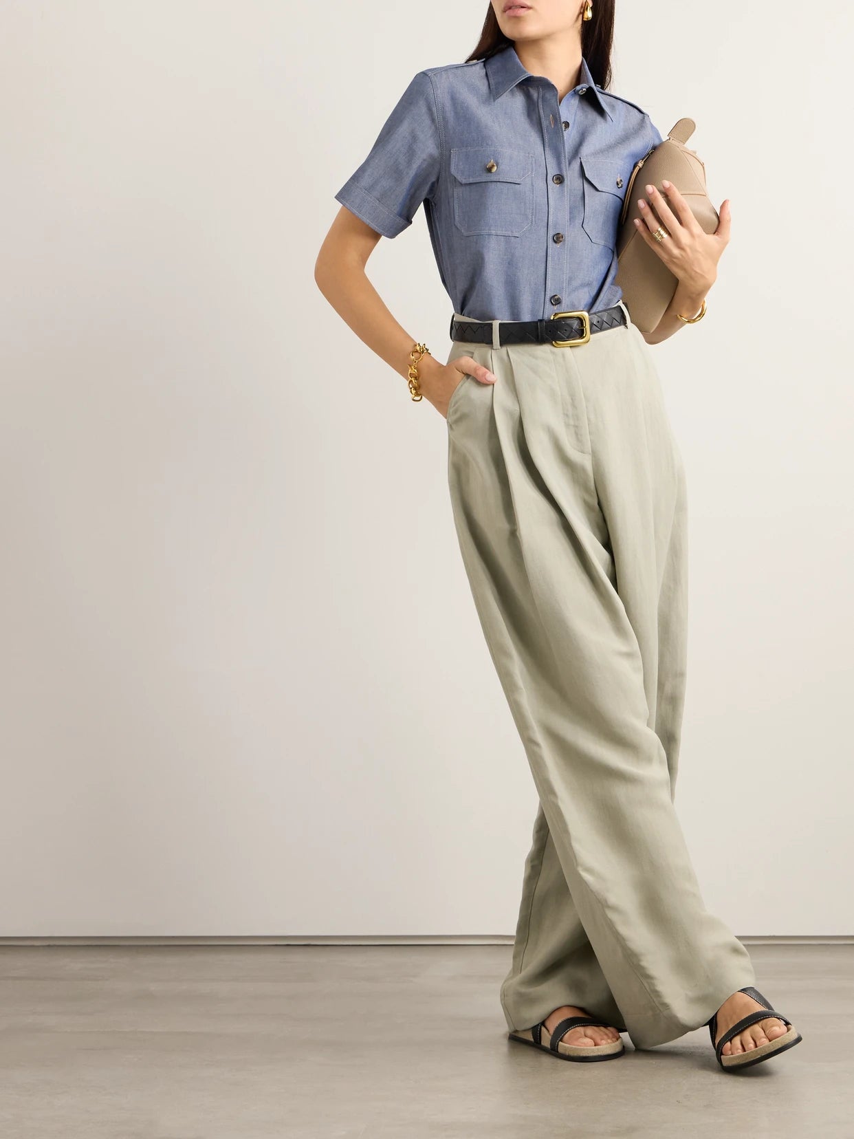 Image of a model wearing Tops. Product name - Annalisa Cotton And Cashmere-blend Chambray Shirt in Mid denim colour by brand - Loro Piana