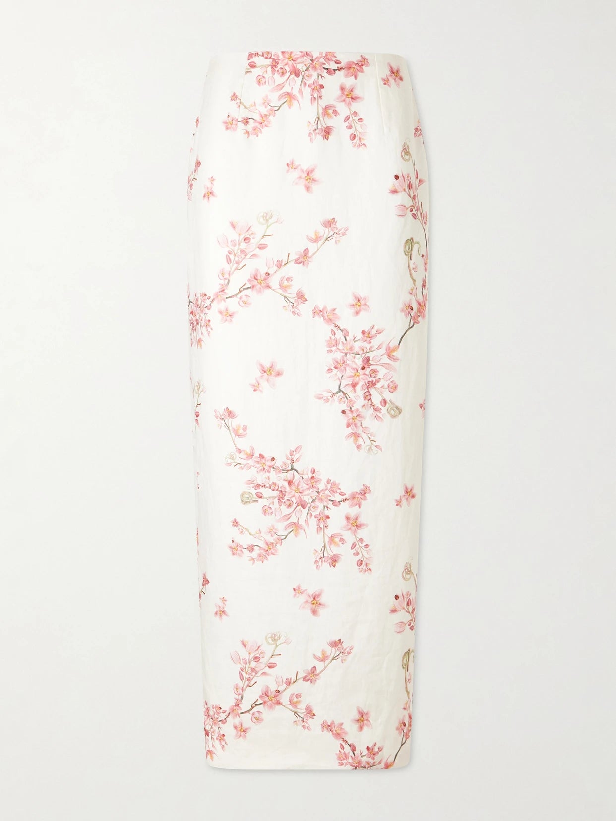 Image of a model wearing Skirts. Product name - Lirica Cauca Floral-print Linen Maxi Skirt in Pink colour by brand - Agua by Agua Bendita