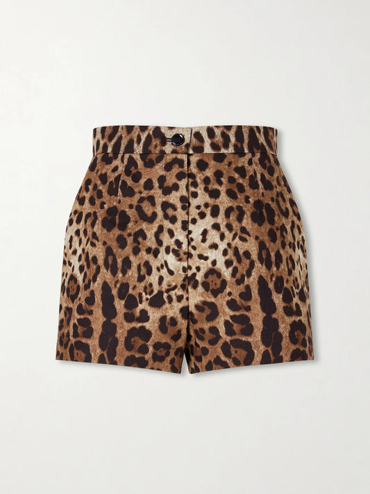 Image of a model wearing Shorts. Product name - Leopard-print High-rise Cotton Shorts in Leopard print colour by brand - Dolce & Gabbana