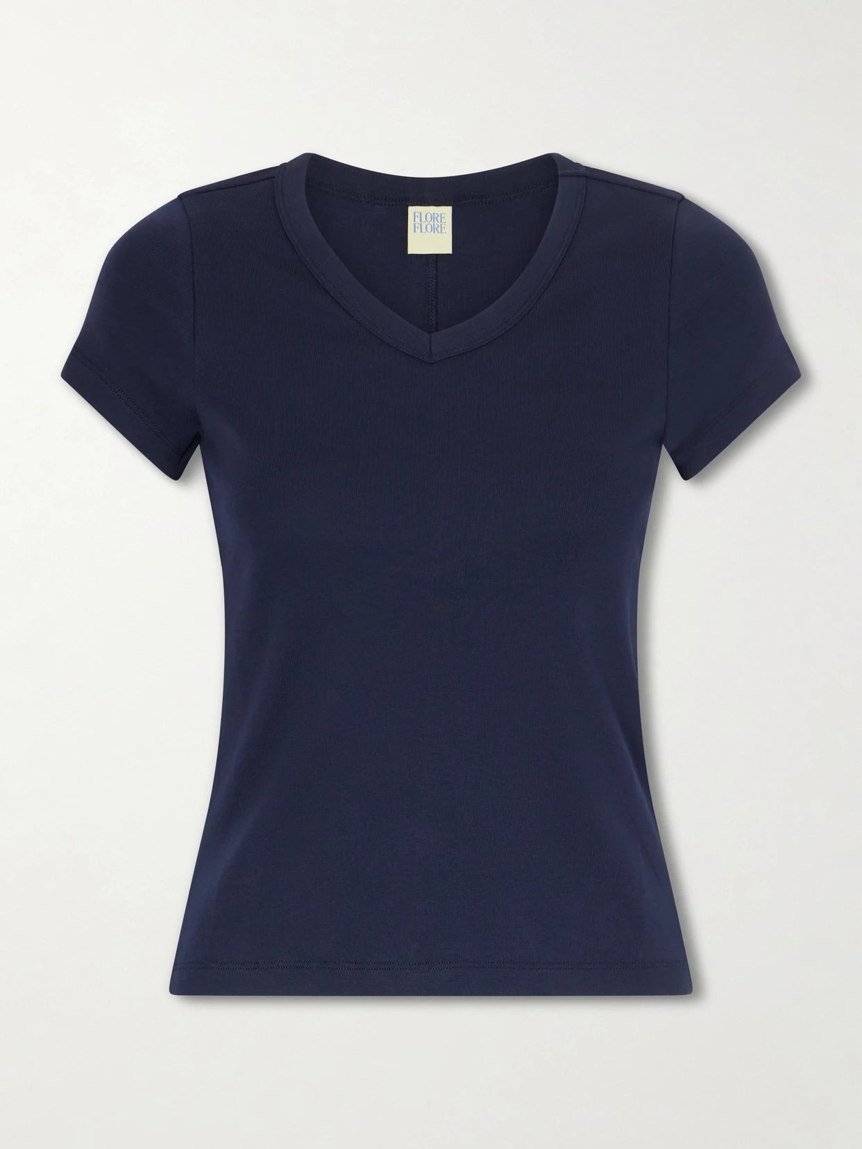 Image of a model wearing Tops. Product name - Jill Baby Organic Cotton-jersey T-shirt in Navy colour by brand - FLORE FLORE