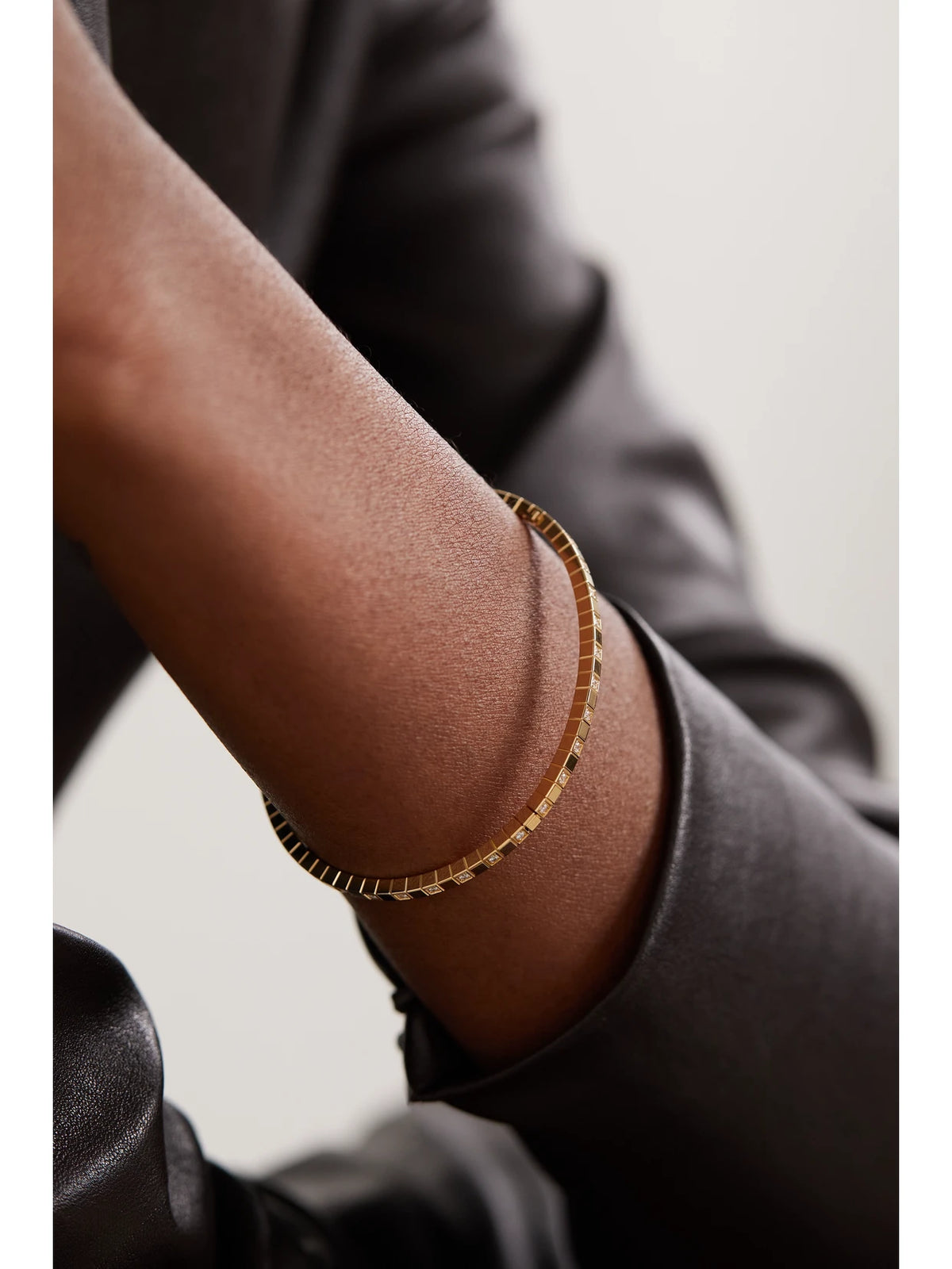 Image of Bracelets. Product name - Ice Cube 18-karat Gold Diamond Bangle in Multi colour by brand - Chopard