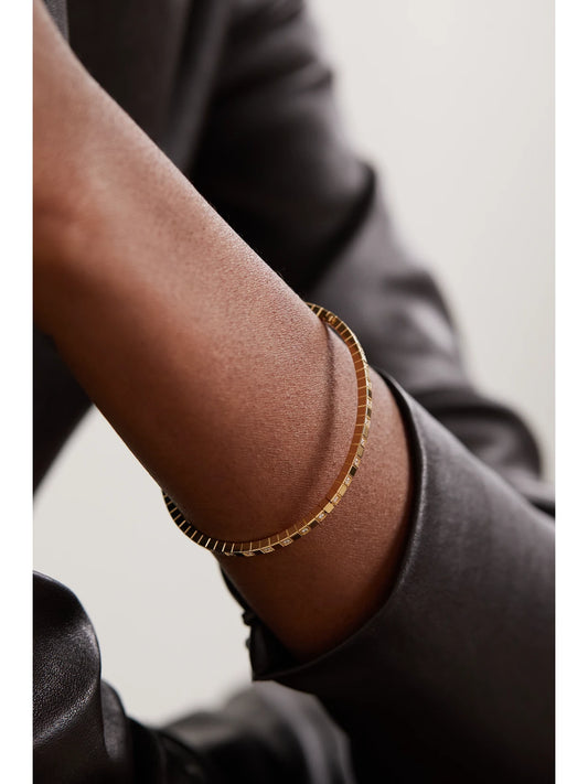 Image of Bracelets. Product name - Ice Cube 18-karat Gold Diamond Bangle in Multi colour by brand - Chopard
