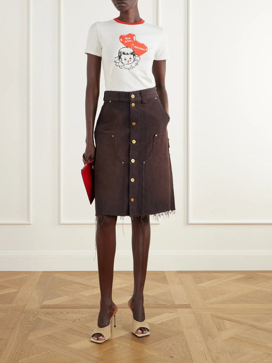 Image of a model wearing Skirts. Product name - Workwear Faded Frayed Cotton Duck-canvas Knee-lenght Skirt in Dark brown colour by brand - Willy Chavarria