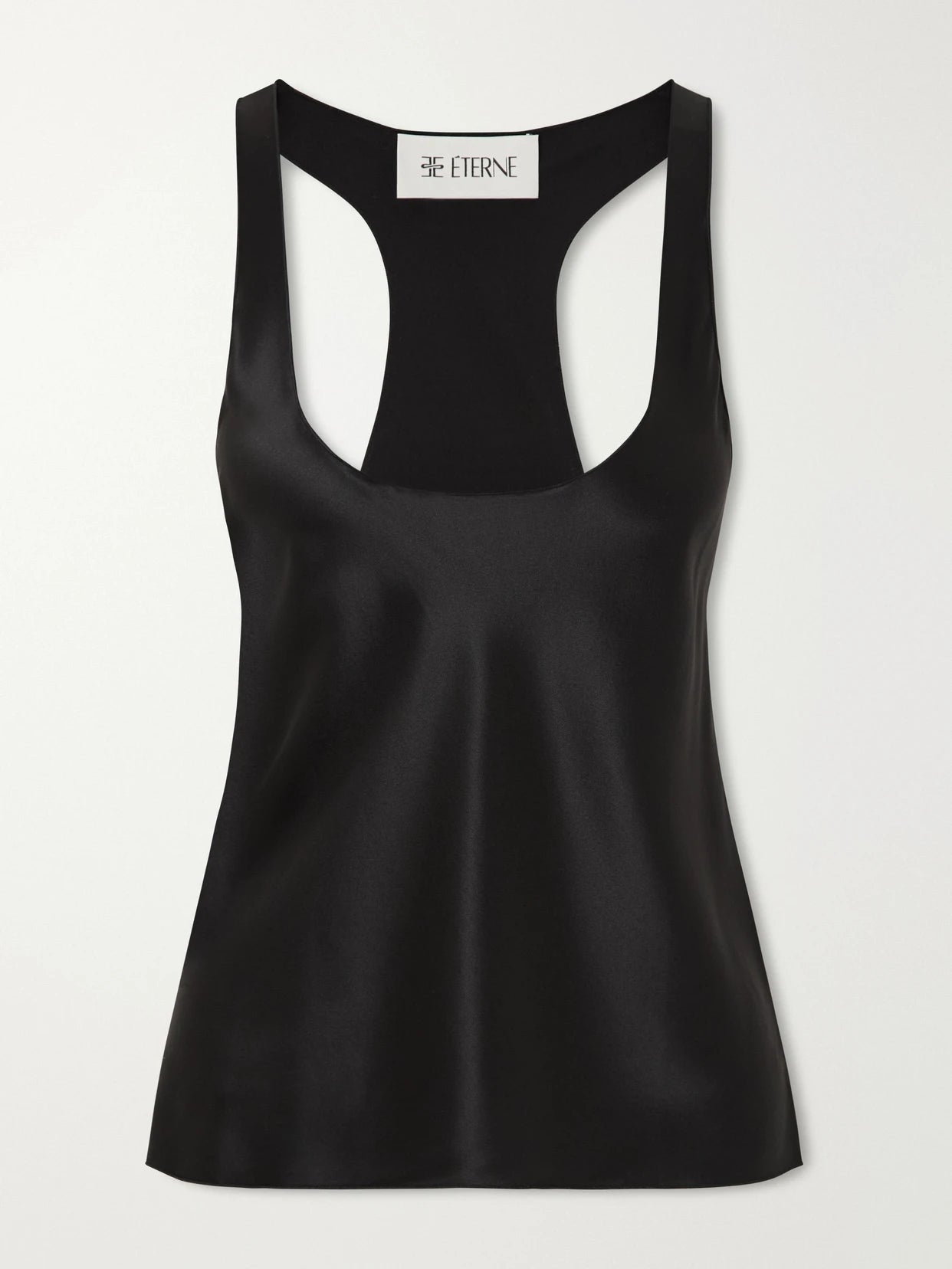 Image of a model wearing Tops. Product name - Hedi Silk-blend Satin Tank in Black colour by brand - ÉTERNE