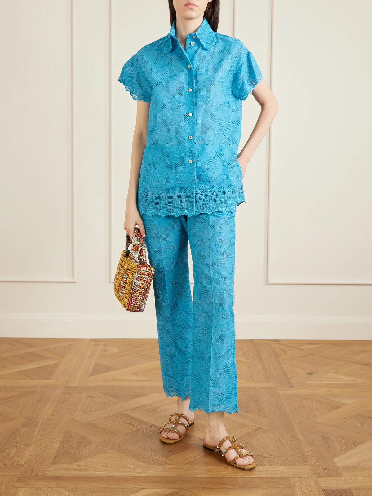 Image of a model wearing Tops. Product name - Broderie Anglaise Cotton Shirt in Blue colour by brand - Valentino Garavani