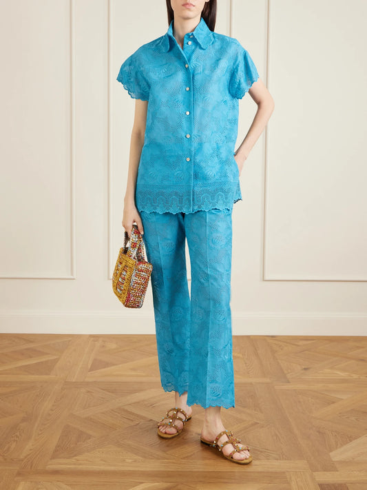 Image of a model wearing Tops. Product name - Broderie Anglaise Cotton Shirt in Blue colour by brand - Valentino Garavani