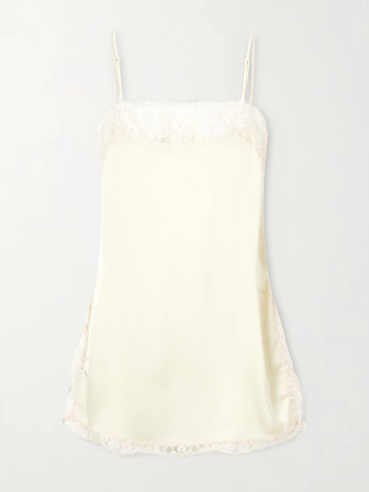 Image of a model wearing Tops. Product name - Adnina Lace-trimmed Recycled-satin Top in Yellow colour by brand - Faithfull