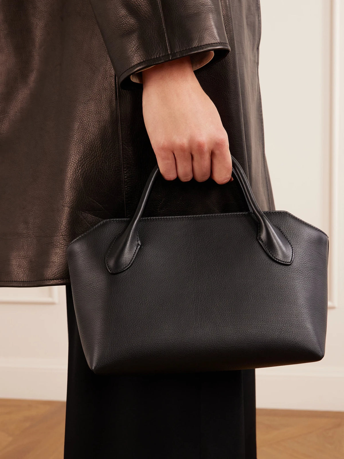 Image of Bags. Product name - Terrasse Textured-leather Tote in Black colour by brand - The Row