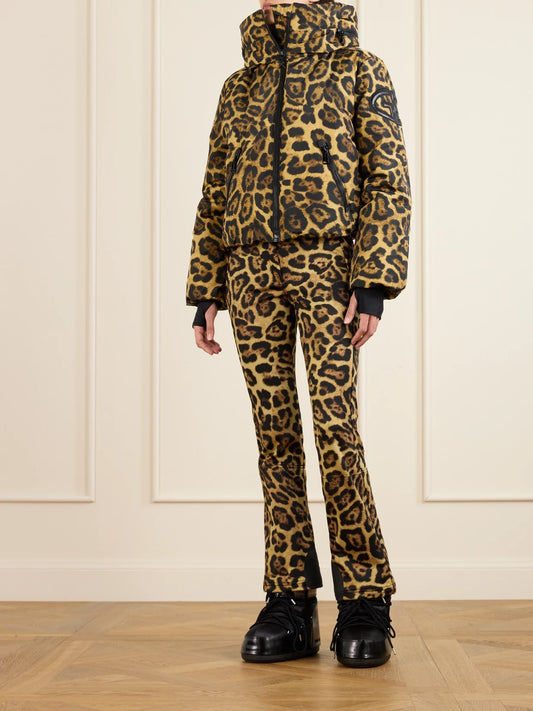 Image of a model wearing Pants. Product name - Minou Belted Leopard-print Ski Pants in Leopard print colour by brand - Goldbergh
