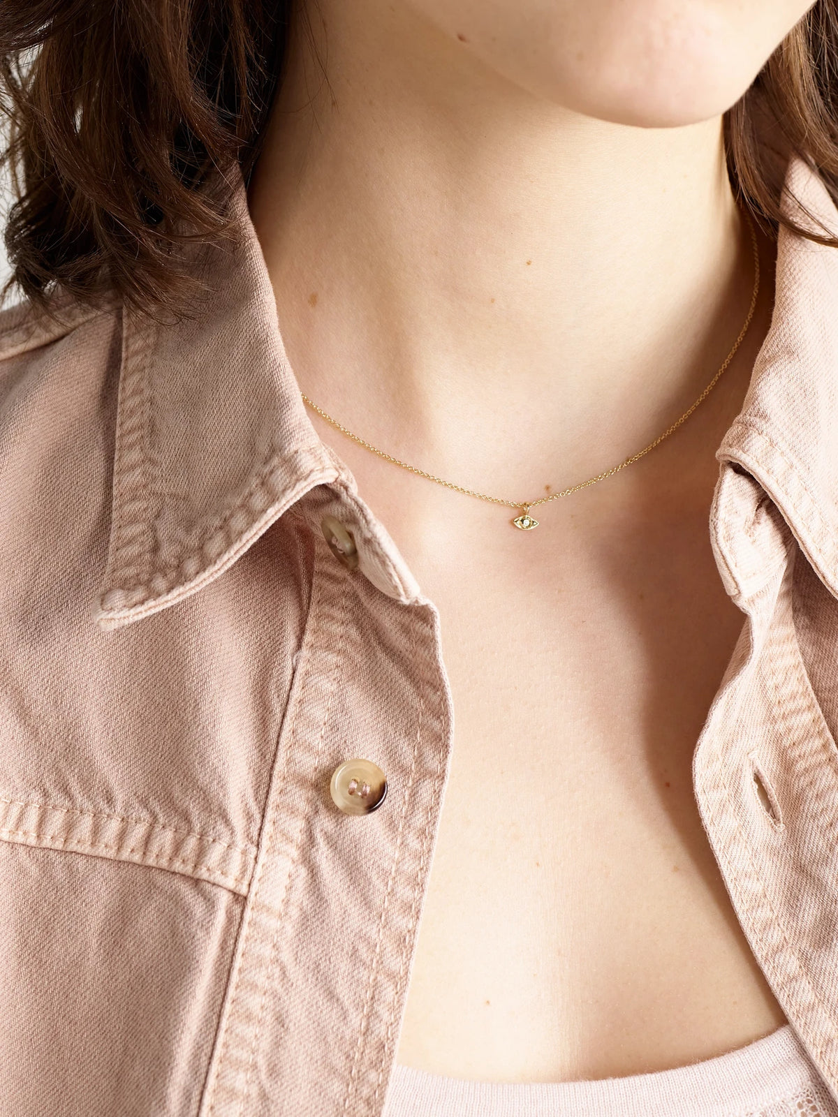 Image of Necklaces. Product name - Mini Evil Eye 14-karat Gold Diamond Necklace in Multi colour by brand - STONE AND STRAND