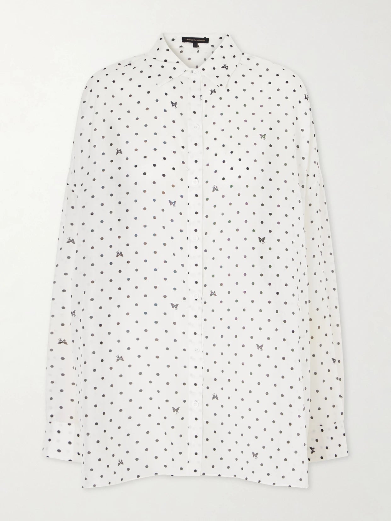 Image of a model wearing Tops. Product name - Kiki Polka-dot Cotton And Silk-blend Shirt in White colour by brand - Kiki de Montparnasse
