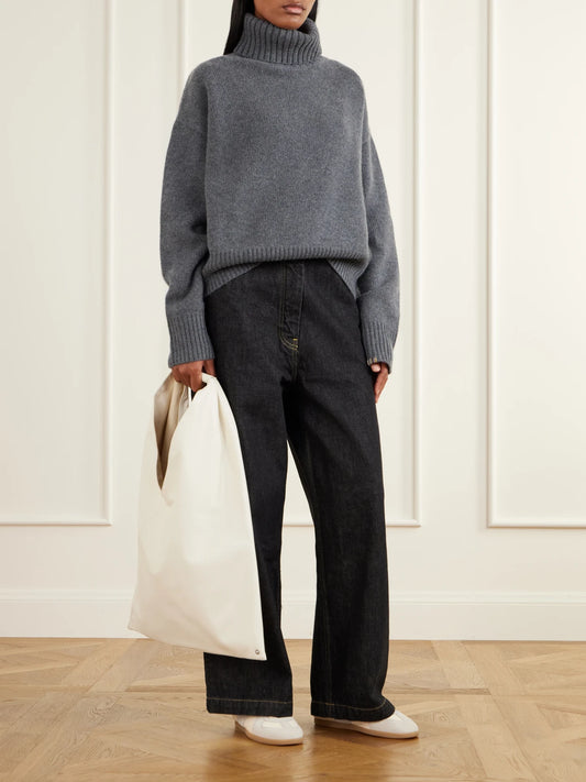 Image of a model wearing Outerwear. Product name - Crop Xtra Cashmere Turtleneck in Dark gray colour by brand - Extreme Cashmere